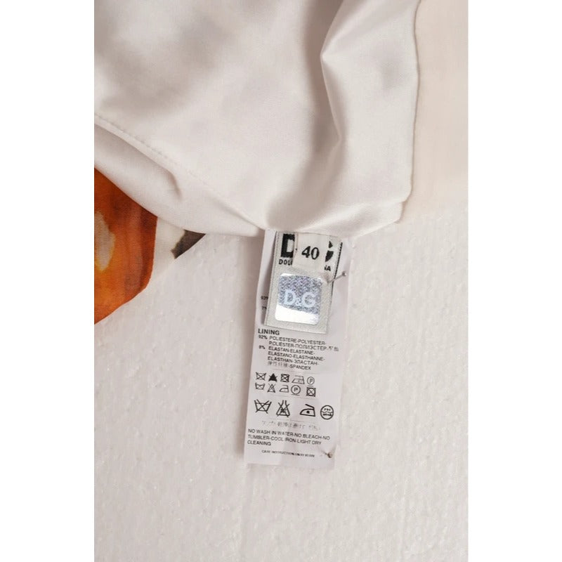 Top Dolce & Gabbana in seta floreale con scollo a V taglia S