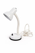 White desk lamp with flexible neck on a white background