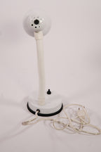 White adjustable lamp with flexible neck on a white background